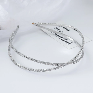 Detail of silver double-layered rhinestone headband with you are beautiful card
