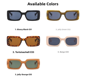 Détail de lunettes de soleil rectangulaires vintage en noir, vert, écaille et beige