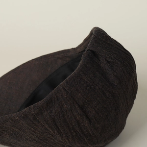 Retro linen newsboy hat in dark brown with breathable texture and black lining