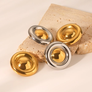 Polished 18K gold stainless steel chunky dome stud earrings on a stone base