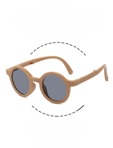 Detail showing foldable round beige frames and dark grey UV lenses for kids