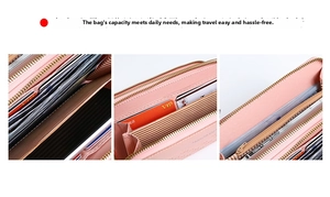 Detail view of pink long wallet showing multi-card slots and striped interior lining