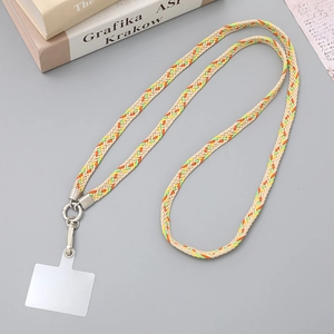 Detailed view of colorful woven phone crossbody strap with metal clasp and gasket