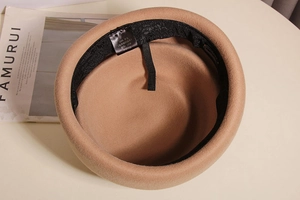 Detail view of 100% wool felt hat interior featuring sweatband and adjustable drawstring