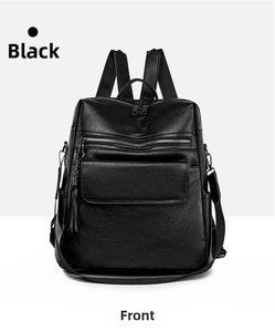 Front view of black pebble leather backpack with multi-layer zipper and tassel detail