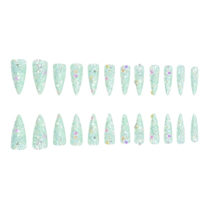 Macro detail of mint green long stiletto press-on nails with colorful glitter and sequins