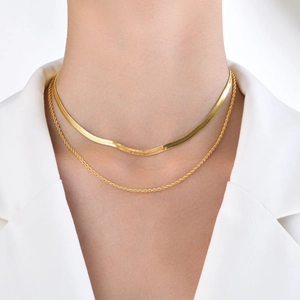 Double layered 18k gold plated snake chain necklace worn with a white blazer for women