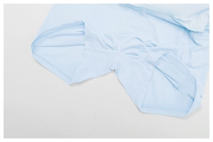 Close-up of light blue breathable mesh fabric detail on high-waisted sports skort