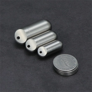Three sizes of titanium waterproof medicine capsules with matte finish and hanging loops