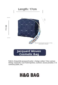 Detail view of denim makeup bag with bow pattern and dimensions 17x11x14 cm