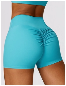 Détail du short de yoga bleu taille haute à effet froncé mettant en valeur le fessier