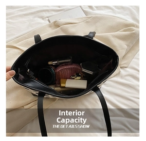 Top view of spacious tote bag interior with zipper pocket and cosmetics storage