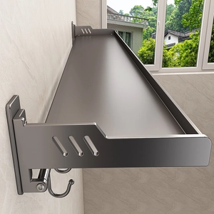 Wall-mounted gunmetal kitchen shelf with hollow design and hooks for spice storage