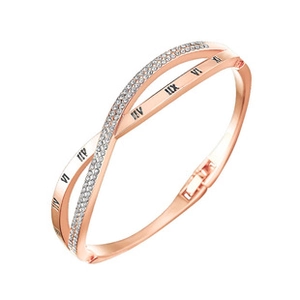 Detailed view of rose gold cross bracelet with embedded diamonds and Roman numerals