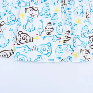 Artistic midi skirt with blue and yellow floral vase print on high-quality white fabric