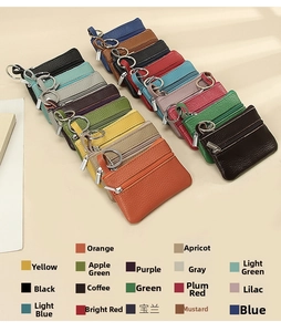 Multiple color options of slim genuine leather coin purses with metallic key rings