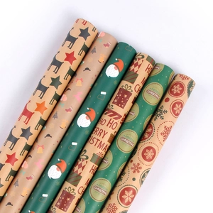 Rotoli di carta regalo di Natale retrò in kraft con motivi di renne e fiocchi di neve