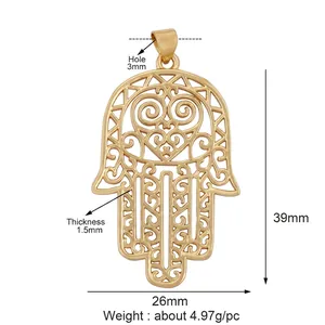 Detailed view of gold Hamsa hand pendant with heart cutout and 39mm x 26mm dimensions
