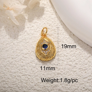 Macro detail of 19mm gold Evil Eye pendant with blue stone and dimension markings