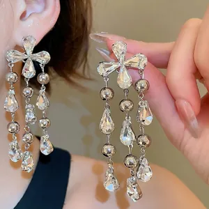 Sparkling crystal flower drop earrings with elegant silver tassels and waterdrop pendants