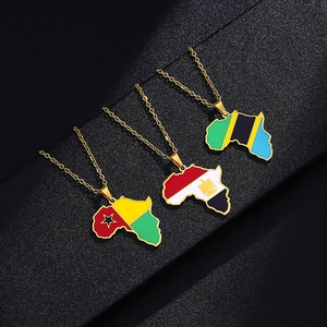 Macro shot of stainless steel African map pendants with Cameroon Egypt Tanzania flags