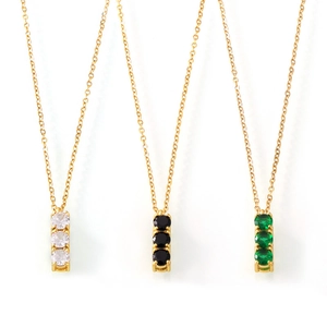 Minimalist gold titanium steel necklace featuring a vertical triple zircon stone pendant