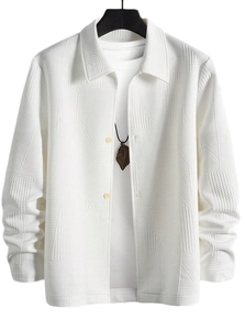Macro detail of white casual jacket featuring unique geometric jacquard texture and buttons