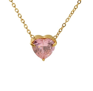 Macro shot of pink heart zircon pendant with gold-plated stainless steel chain necklace