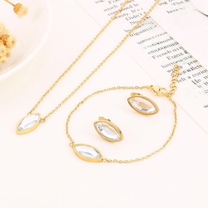 Parure bijoux dorée avec collier bracelet et boucles d'oreilles en zircone ovale