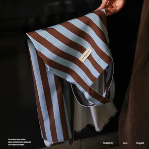 Classic striped cotton kitchen apron with adjustable straps in brown and light blue
