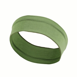 Detail view of a green elastic sports headband made of soft breathable fabric for yoga