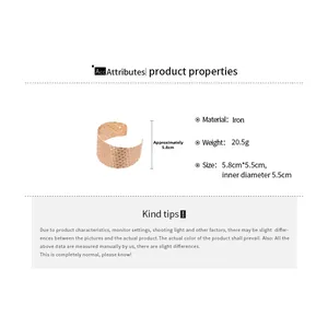 Detailed view of irregular geometric rose gold iron cuff bracelet with size parameters