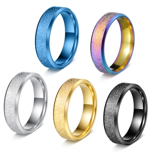 Frosted matte finish stainless steel wedding rings in blue, silver, gold, and black