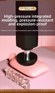 Pink hot water bottle undergoing a 500kg high pressure crush test for explosion proof safety