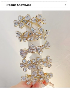 Detailed view of 5-piece gold alloy hair clips set with sparkling rhinestones and florals