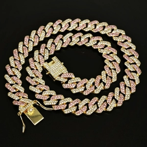 Close-up of 14mm Cuban chain box clasp with pink and white rhinestones on gold metal