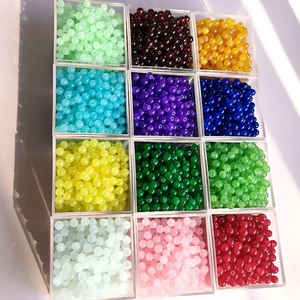 Multi-colored 4-8mm glass beads set in clear boxes for DIY jewelry making and crafting