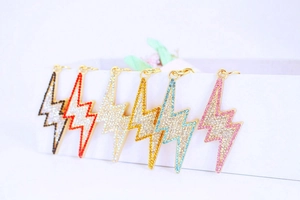 Detail of lightning bolt charms with colorful rhinestones for jewelry making