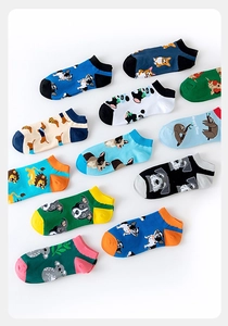 Detailed set of colorful men's ankle socks with cute cartoon animal patterns