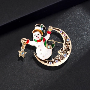 Christmas snowman on crescent moon brooch with stars and multicolored rhinestones