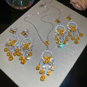 Elegant silver butterfly jewelry set with yellow zircon water drop pendants and earrings