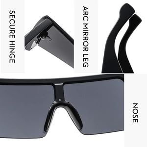 Macro detail of secure hinges, arc mirror legs, and integrated nose pads on oversize sunglasses