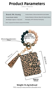 Detail of silicone bead wristlet with leopard print card holder and gold keychain
