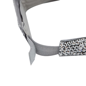 Detail of adjustable velcro closure and sparkling rhinestones on the silver sun visor