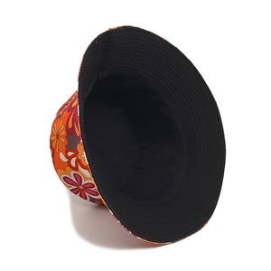 Double-sided floral bucket hat featuring a vibrant flower print and plain black lining