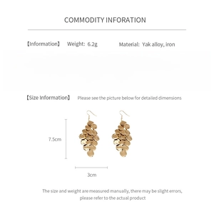 Detailed spec sheet for gold leaf tassel earrings showing 7.5cm length and alloy material