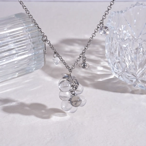 Cold style beaded grape pendant necklace with rhinestone star and silver chain detail