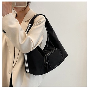 Chic black nylon underarm bag with striped strap and detachable coin pouch detail