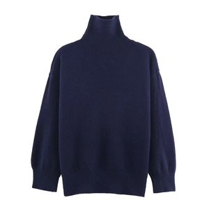 Women's dark blue turtleneck knit sweater featuring loose fit and ribbed cuffs design