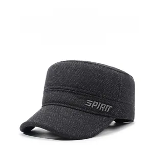 Detail view of deep grey flat top hat with SPIRIT embroidery and ear protection